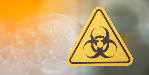 Warning signs on hospital containment room windows notified by disease control specialists. Perform disease treatment for patients infected with coronavirus.