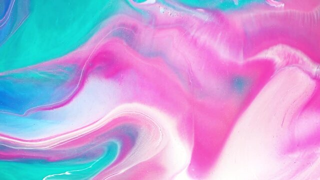 Fluid art drawing video, modern acrylic texture with flowing effect. Liquid paint mixing backdrop with splash and swirl. Detailed background motion with pink, aquamarine and white overflowing colors.