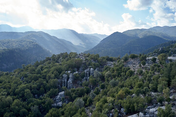 Panoramic aerial view of mountains and sky on a summer day.