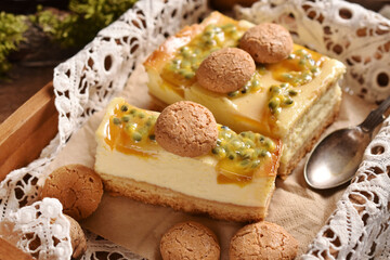 Easter cheesecake with peach and passion fruit on festive table
