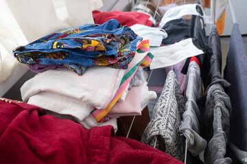 casual clothes hanging to dry at home