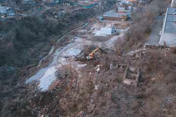 destruction of old buildings and structures. development for new housing. drone photo