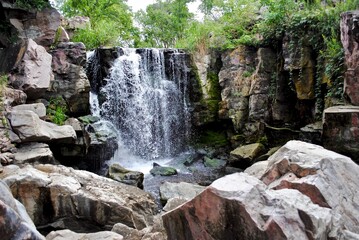 Fototapeta na wymiar Winnewissa Falls, is in Pipestone National Monument, located in southwestern Minnesota. The catlinite, or 