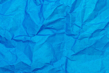 crumpled blue paper background texture close up copy space