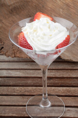 strawberries with fresh cream as gourmet dessert