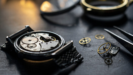 Mechanical watch repair process. Watchmaker