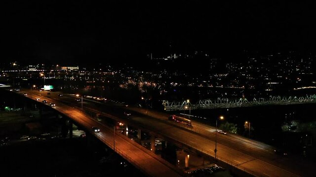 Drone view of Portland's 4th of July Fireworks Show and traffic on highway