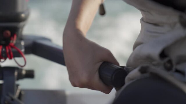 riding boat accelerating outboard motor close-up