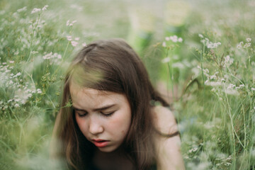 girl with wildflowers in the field