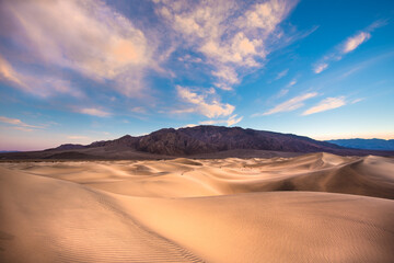 Fototapeta na wymiar Beautiful sand dunes landscape seen at Death Valley National Park, California at sunset