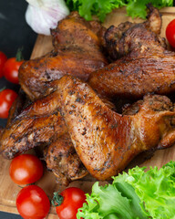 Grilled chicken wings. Low-carb and high-fat food. Menu for carnivore or keto diet