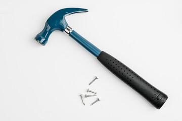 Hammer and nails on a white background.