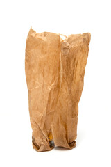 crumpled greasy paper bag on white background