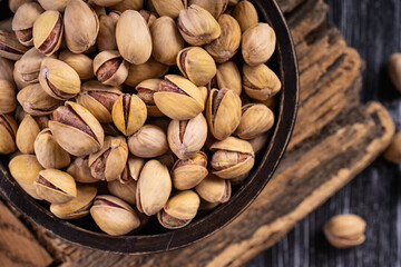 Organic pistachios. Pistachios in shell. Food background.