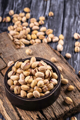 Organic pistachios. Pistachios in shell. Food background.
