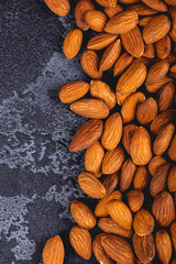 Peeled almonds closeup. For vegetarians. Food background.