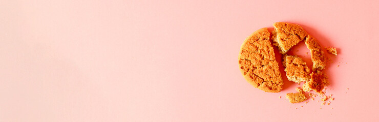 Homemade cookies on pink background. Minimal composition. Flat lay, top view