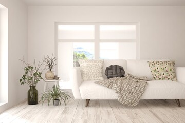 Fototapeta premium White living room with sofa. Scandinavian interior design. 3D illustration