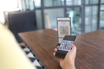 Qr code payment. E wallet. Man scanning tag accepted generate digital pay without money.scanning QR code online shopping cashless payment and verification.technology concept