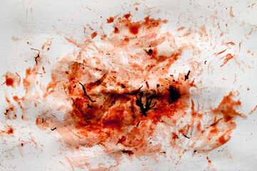 blood stains smeared on white paper