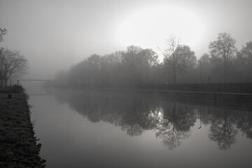  gloomy river in the fog. High quality photo