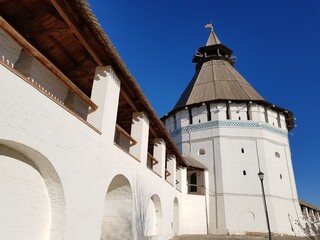 Fototapeta premium The white stone walls and towers of the ancient fortress