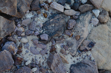 surface structure of brown shades of natural stone outdoors in nature