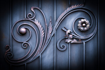 wrought-iron gates, ornamental forging, forged elements close-up.