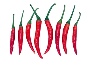 Fotobehang Close-up a lot of red hot chilli pepers, spicy food concept, yummy, Thai styles, ingredian of Thai food, hot and spicy clipping path isolated on white background. © Mongkol