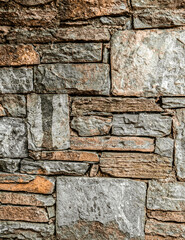 dark stone wall closeup, textured pattern, natural background