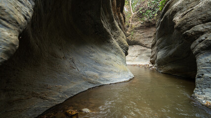 A rocky cliff with water erosion, Streams in the rocks, beautiful views, Wang Sila Laeng, Nan, Thailand