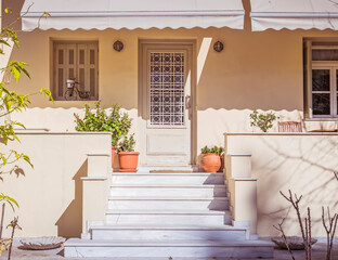 white marble stairs to elegant house entrance door, Athens Greece