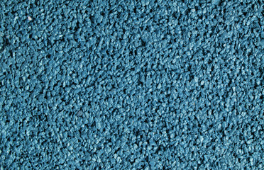 Decorative stone coating texture background in blue color