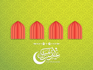 Arabic Calligraphic text of Eid Mubarak for the Muslim community festival celebration.