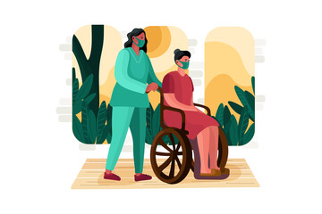 Nurse pushing wheelchair of patient