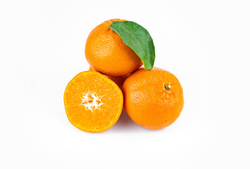 Ripe fresh juicy tangerines with leaves on white background