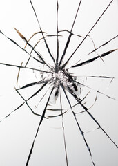 Cracks on the glass on a white background.