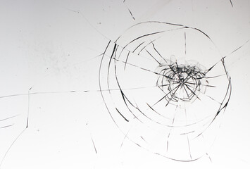 Cracks on the glass on a white background.
