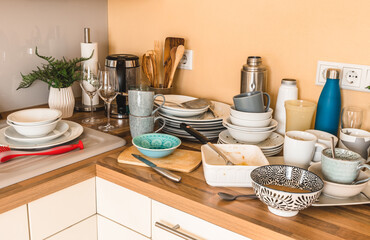 Pile of dirty dishes in the kitchen - Compulsive Hoarding Syndrome
