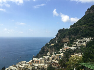 Overlooking the Cliffs of Positano, Italy and the blue waters of the Tyrrhenian Sea