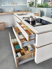 Modern kitchen, Open drawers, Set of cutlery trays in kitchen drawer. Solid oak wood cutlery drawer...