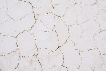 Sandy white cracks on surface texture