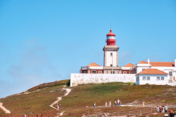 Fototapeta na wymiar Portugal. Cape Rock Lighthouse. Cabo da Roca is the westernmost point of continental Europe. Travel and attractions