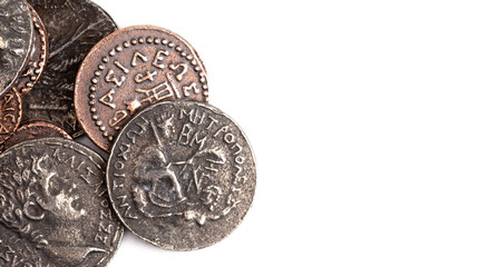 Pile of Ancient Roman Coin Replicas  Isolated on a White Background