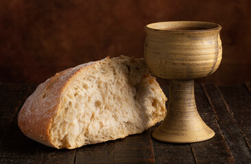 Sacrament of Holy Communion  on a Dark Wooden Table
