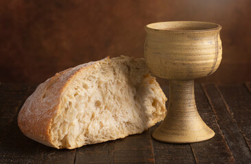 Sacrament of Holy Communion  on a Dark Wooden Table