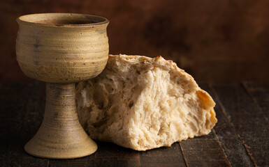 Sacrament of Holy Communion  on a Dark Wooden Table