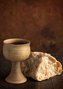 Sacrament of Holy Communion  on a Dark Wooden Table