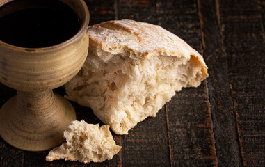 Sacrament of Holy Communion  on a Dark Wooden Table
