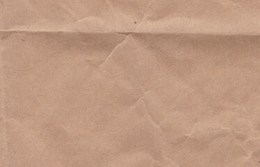 Crumpled cream paper background texture. Paper craft